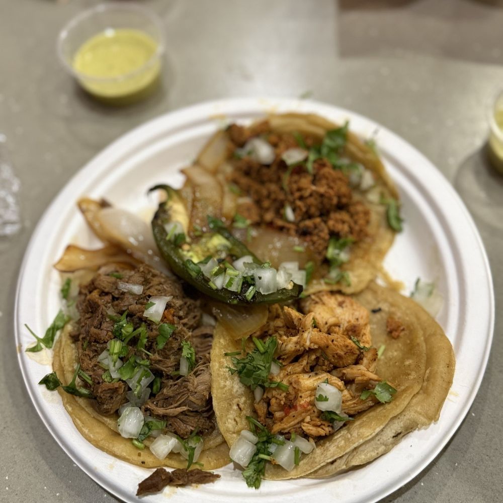 Taqueria Sabrosa signature dishes Tacos al PastorTripitas TacosSabrosa Fries (Carne Asada Fries)